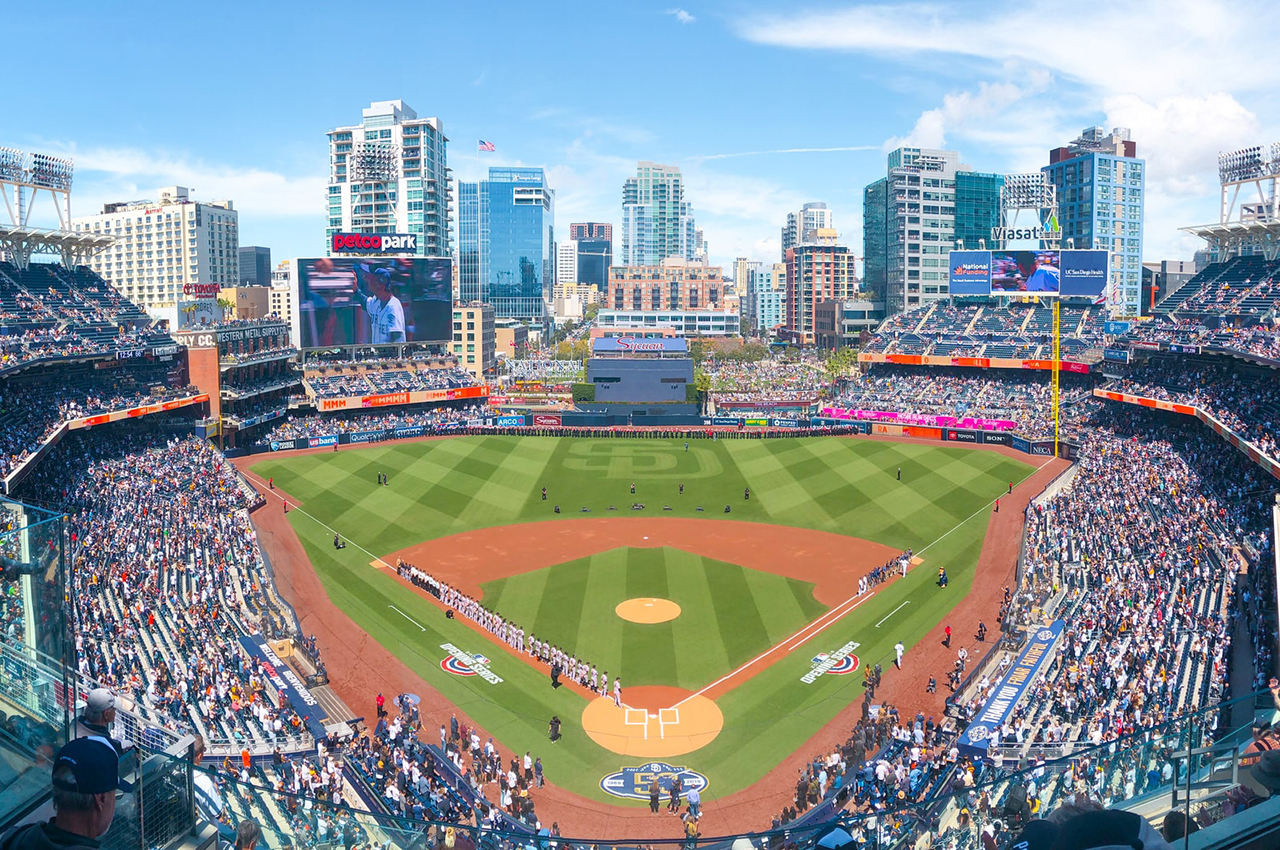 View of PetCo Park on a game day in San Diego, with the Downtown skyline in the background.