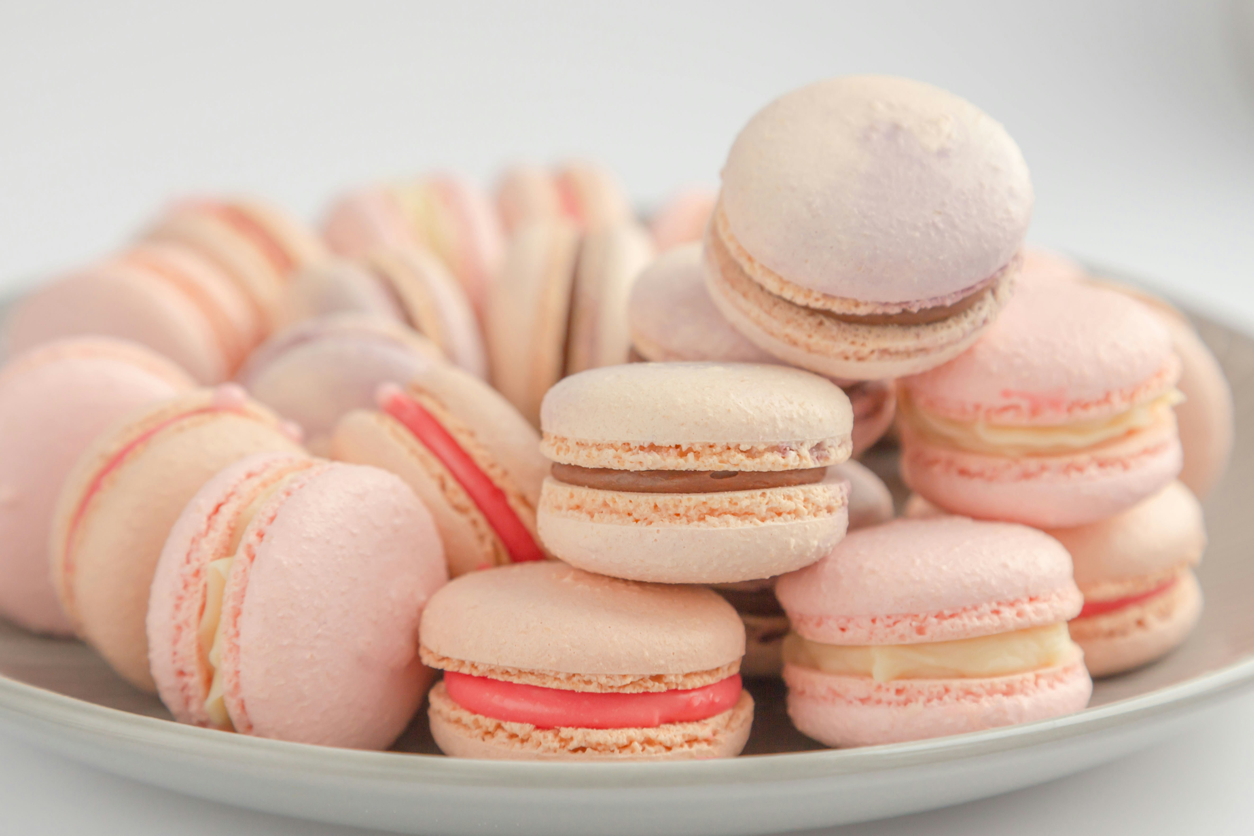 A plate of macarons stacked on top of each other